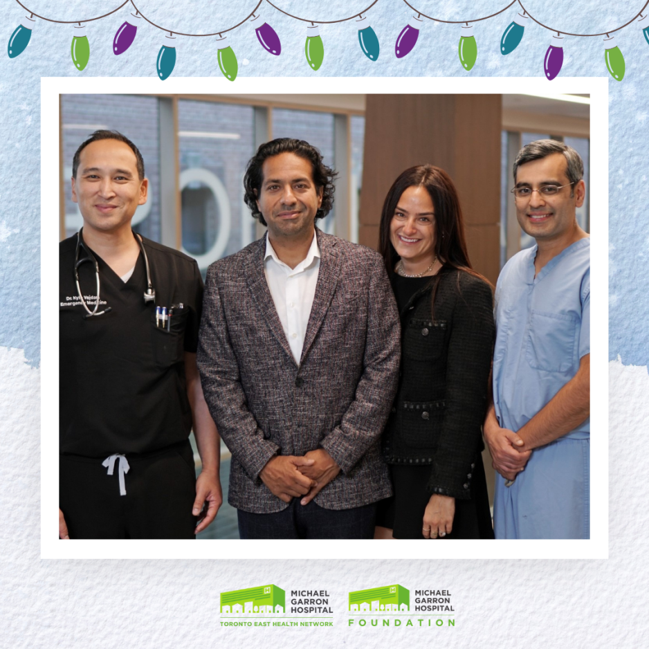 Two donors and two healthcare workers standing together and smiling inside the lobby of Michael Garron Hospital