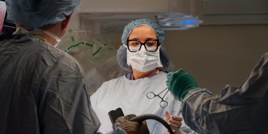 Physician doing surgery.
