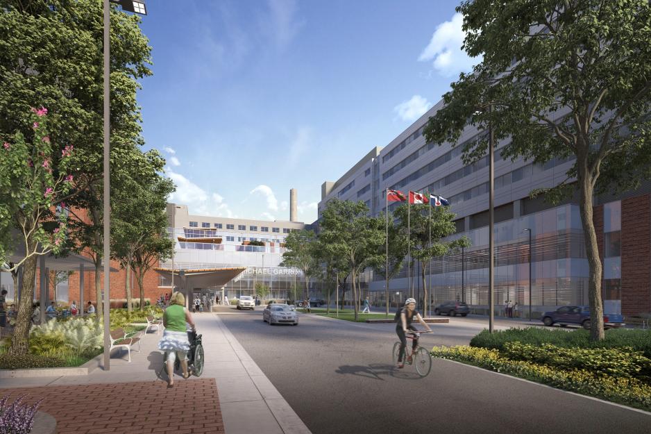 Rendering of MGH's future main entrance with modern glass hospital building, landscaped driveway, green spaces with trees and seating. pedestrians and cyclists move through the space.