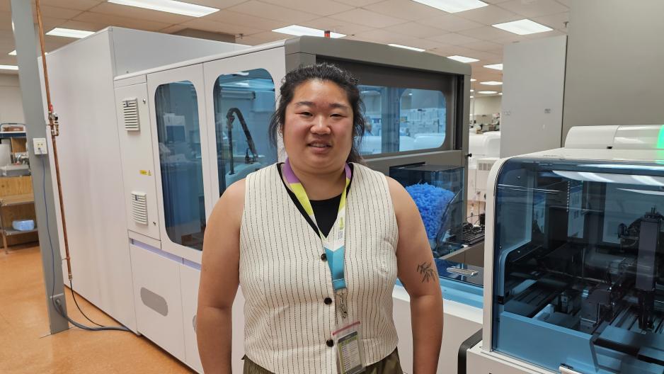 Person standing in a lab.