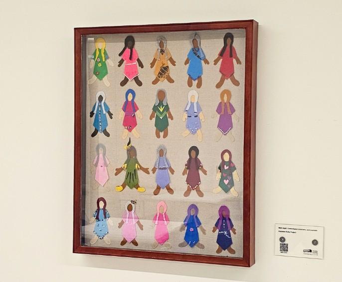 Faceless Dolls display